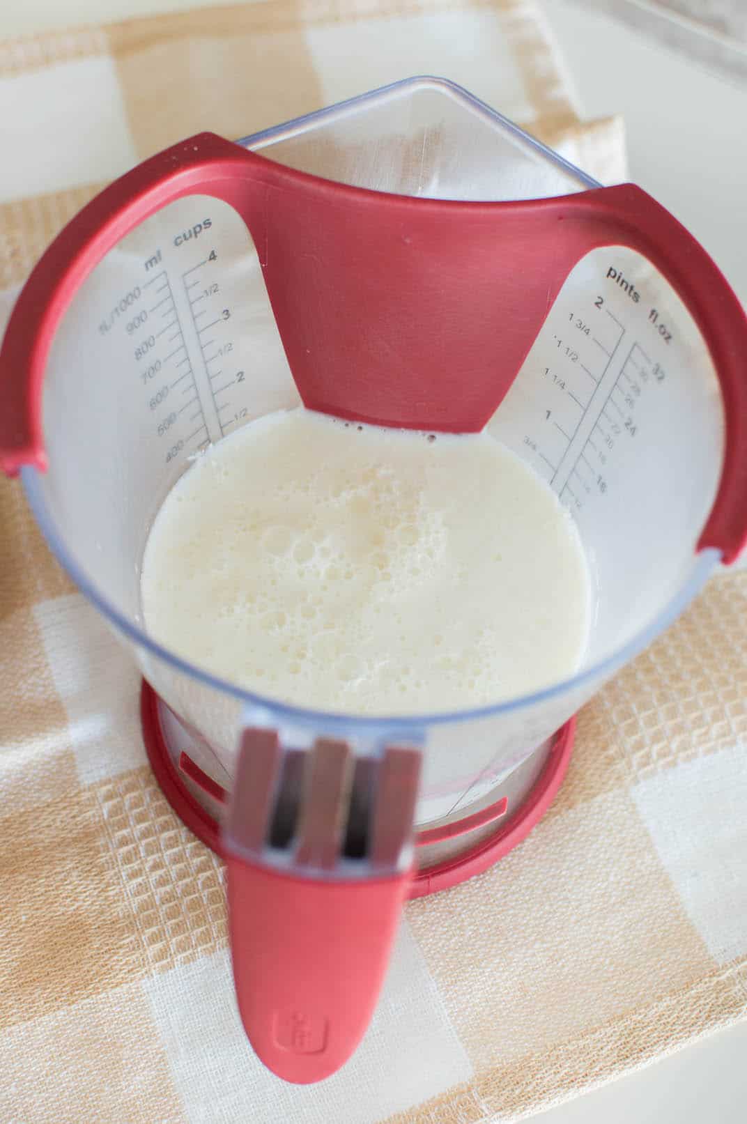 Buttermilk in a measuring cup
