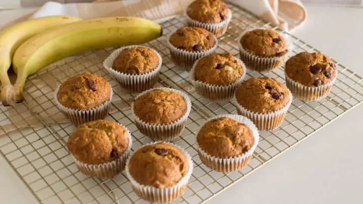 banana chocolate chip muffins on a cooling rack