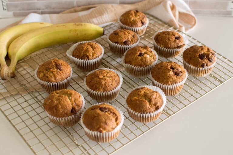 banana chocolate chip muffins on a cooling rack
