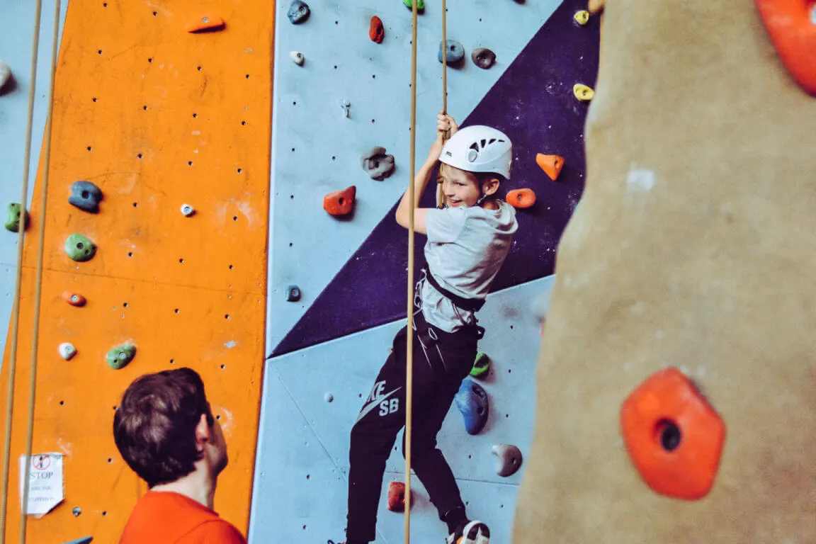 Active Birthday parties in calgary - Boy on climbing wall