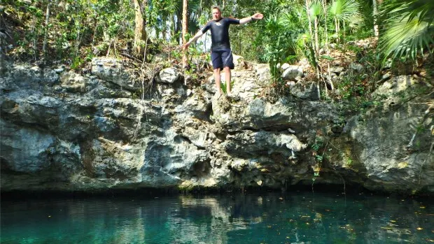 Jumping in to an open cenote