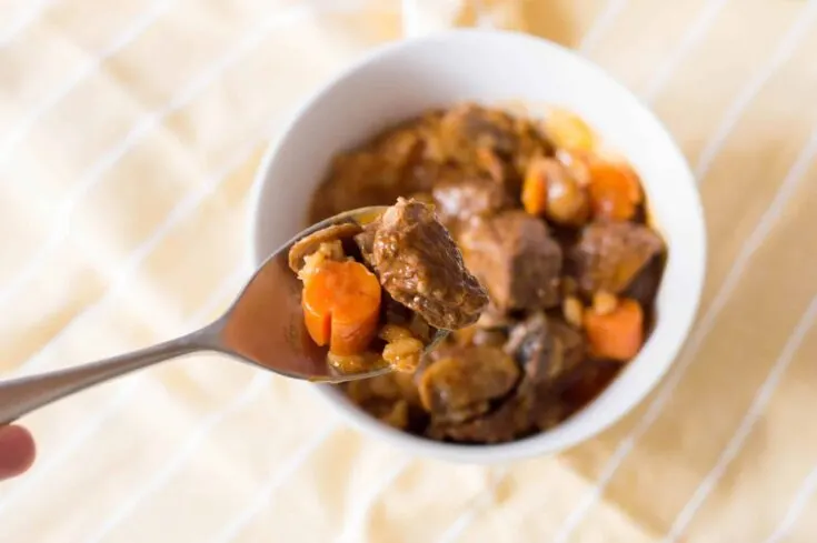 Beef stew in a white bowl