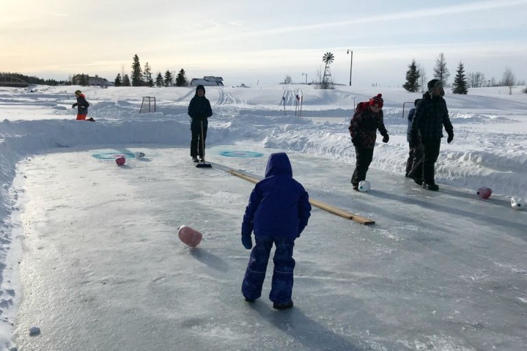 Curling with frozen milk jugs
