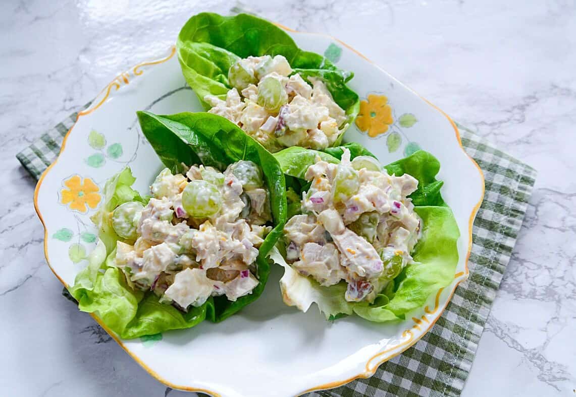 Chicken pear grape salad on lettuce leaves