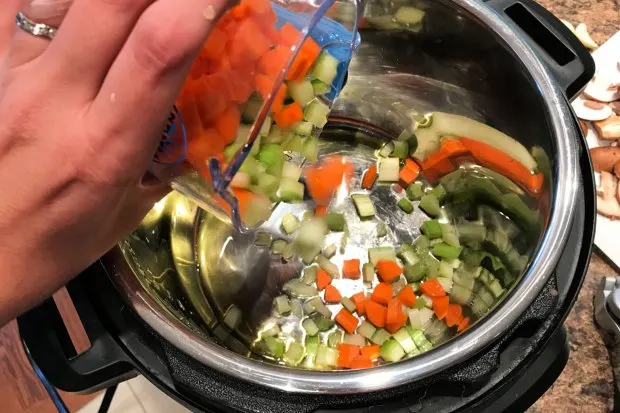 Adding chopped veggies to the Instant Pot