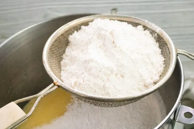 Sift in salt sugar and flour