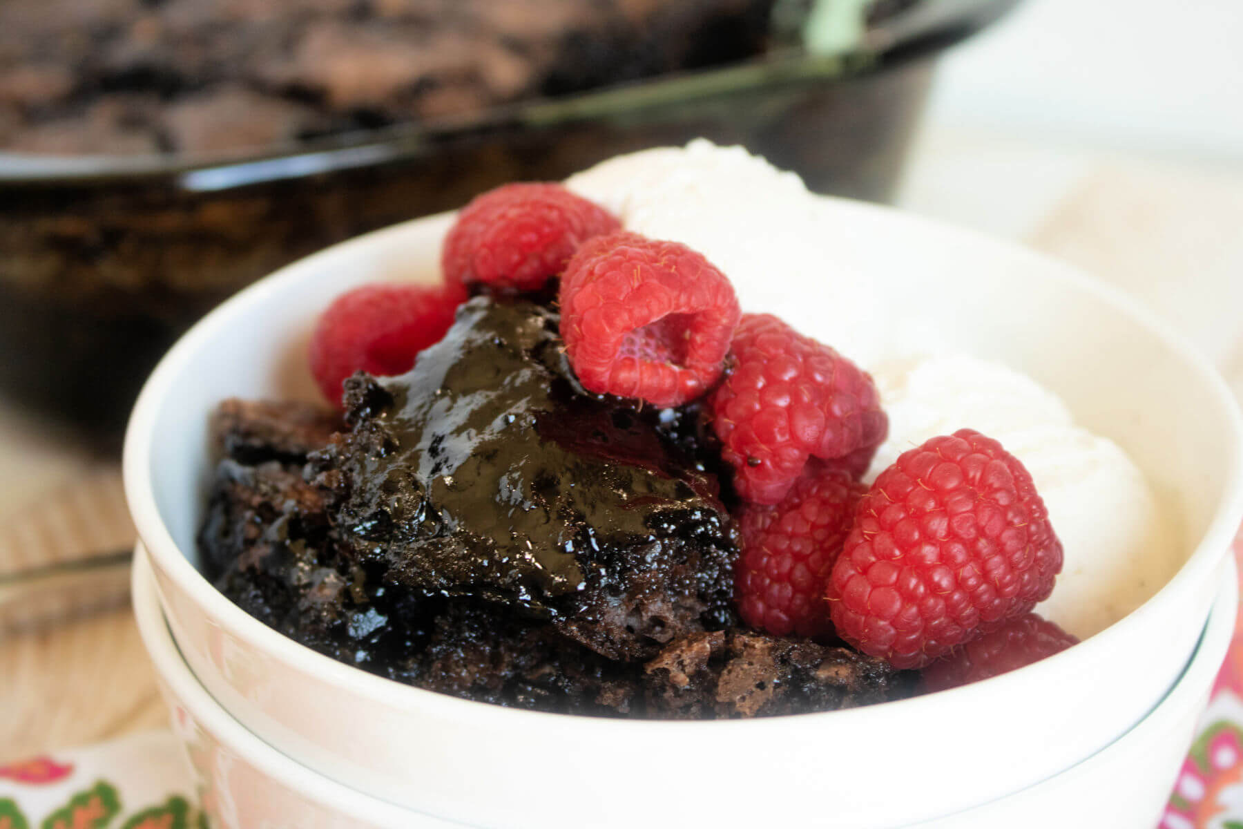Chocolate Cobbler with ice cream and raspberries