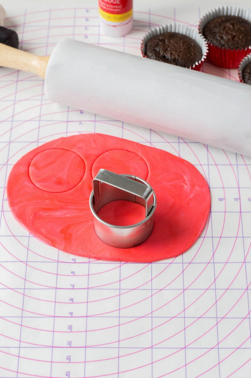 Use a cookie cutter to cut red fondant