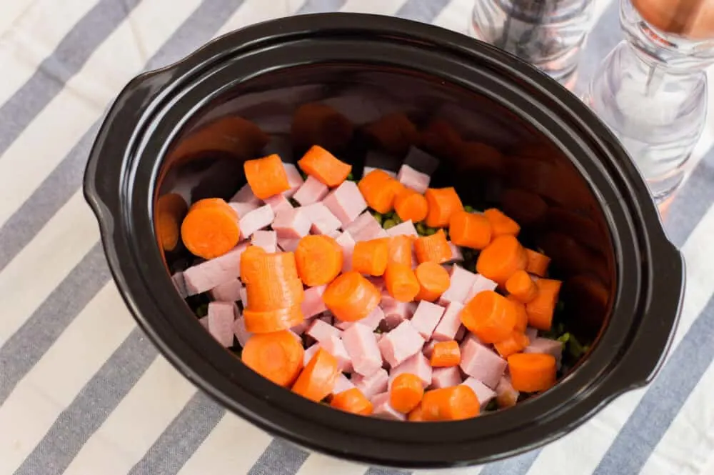 add carrots to the slow cooker