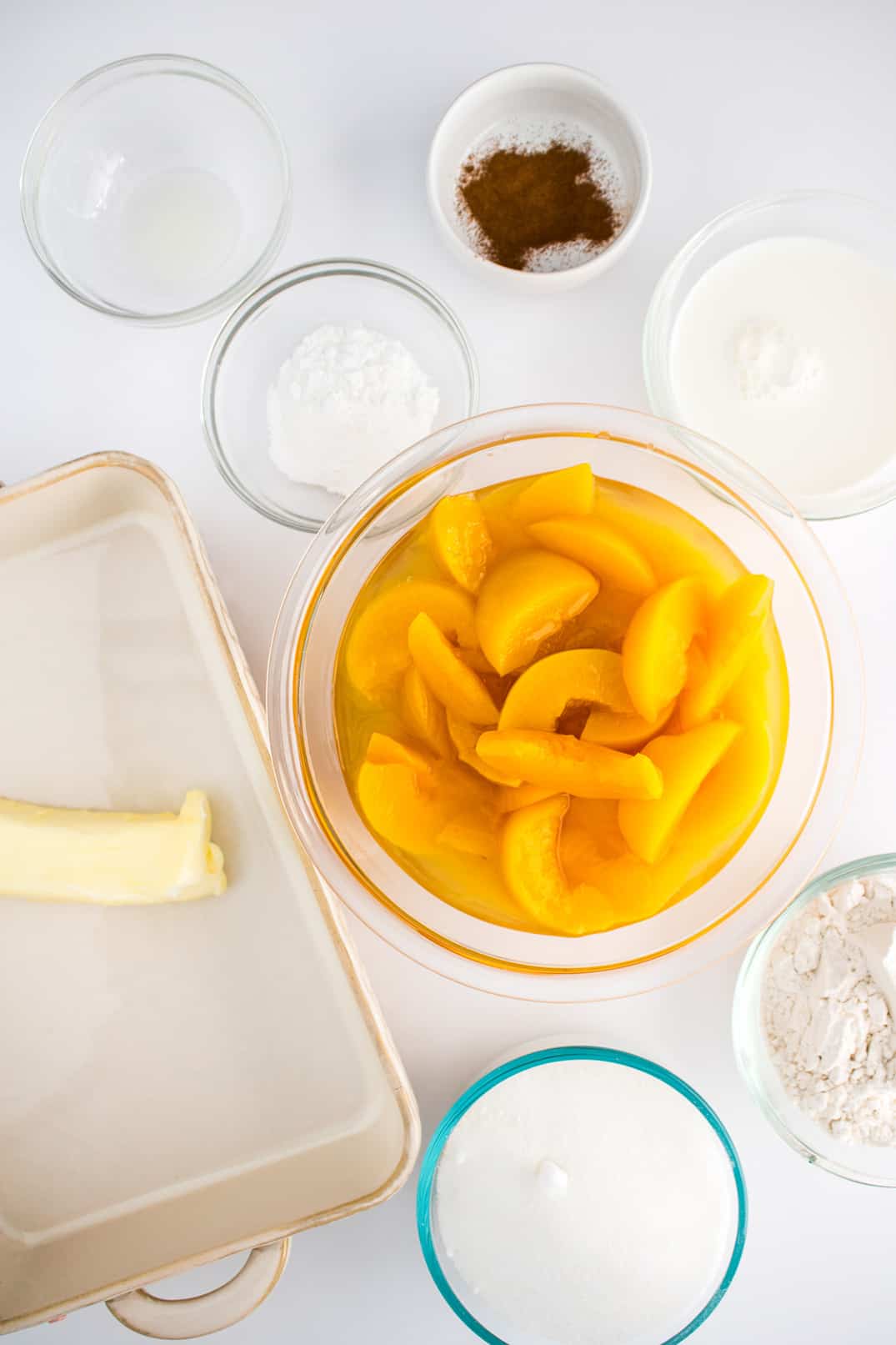 Ingredients laid out to make the best ever southern peach cobbler