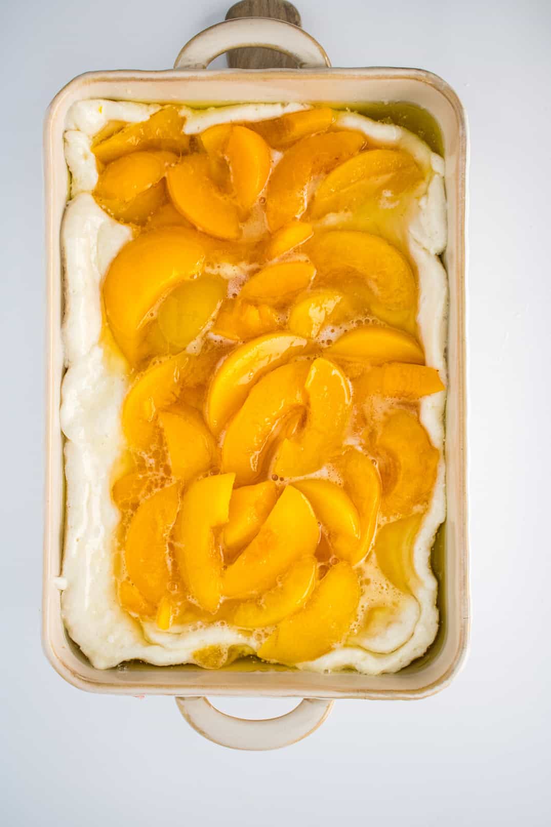 Assembling and layering my southern peach cobbler