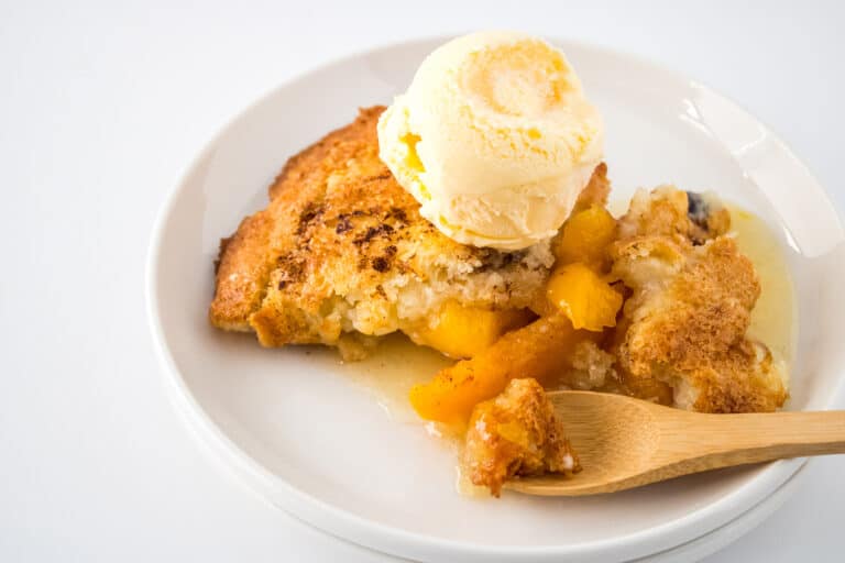 Folks, this is the ONLY Southern Peach Cobbler recipe you’ll ever need. If you want to know what sweet, delicious southern baking tastes like… this peach cobbler is your answer! Tons of flavor made with care and love.