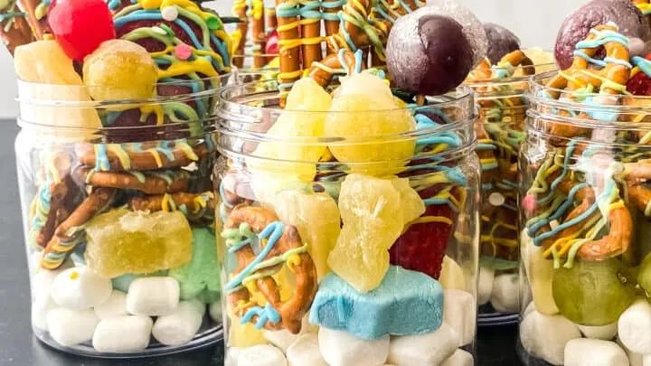 Got a major sweet tooth? Then our Sweet Jarcuterie is a MUST! Indulge in a jar filled with delicious sweets like candied fruit, chocolate-covered pretzels, and marshmallows.