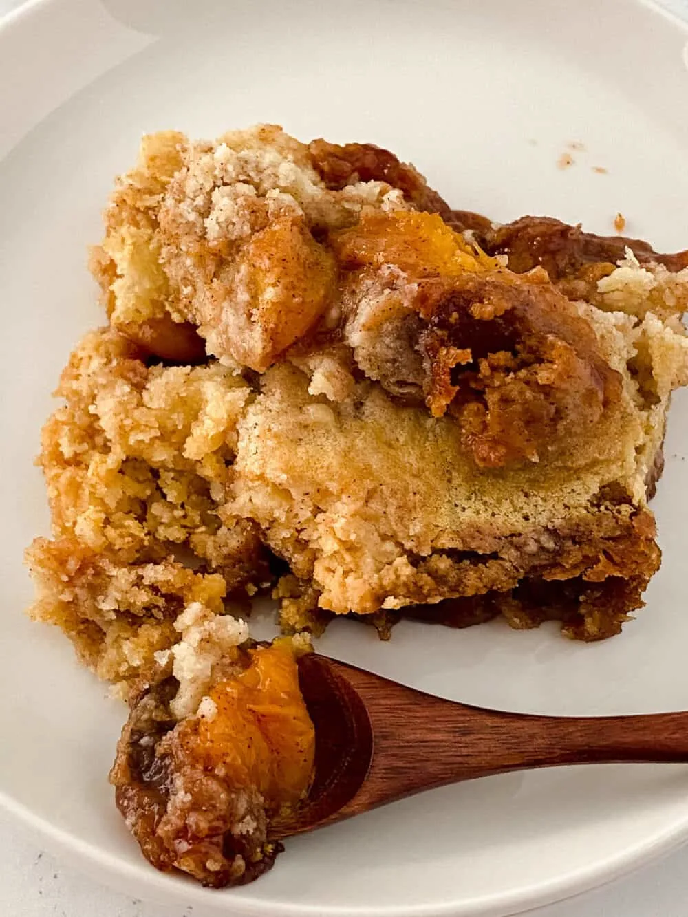 My Cake Mix Peach Cobbler is absolutely delectable. Whenever I make it, it’s eaten up in a matter of minutes. It’s amazing to see how far a box of cake mix can take you!