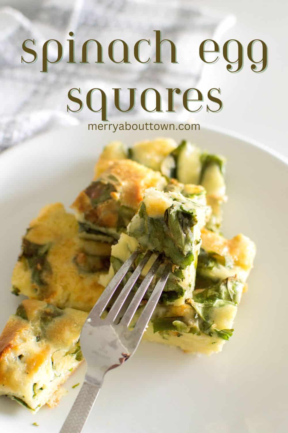 Spinach egg squares on a white plate