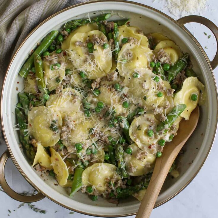 Image for Creamy Asparagus Ravioli with Sausage and Peas