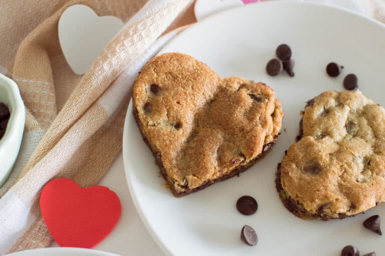 Treat your loved ones to a thematic treat this Valentine’s Day! My heart-shaped chocolate chip cookies are adorable, chewy, and filled with chocolate-y goodness.