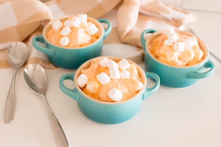 3 pots filled with a generous amount of Orange Fluff Salad