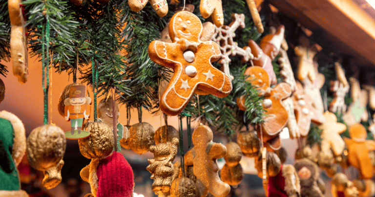 Handmade christmas items hanging in a market stall
