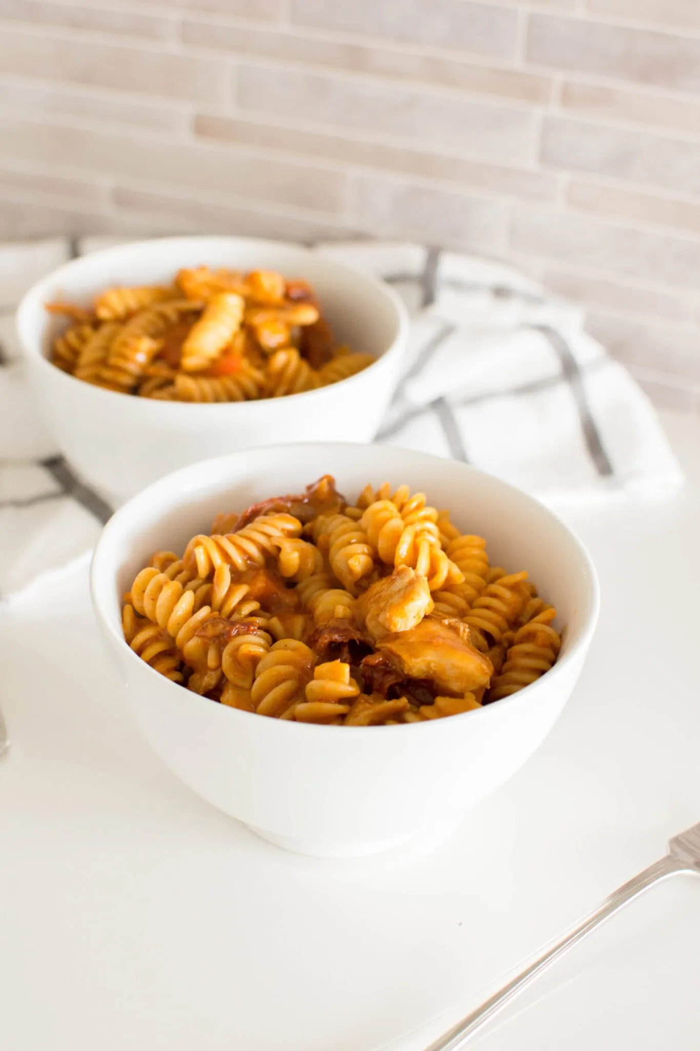 Gluten-free butter chicken pasta fusion dish GF creamy tomato sauce with halal chicken for weeknight dinner