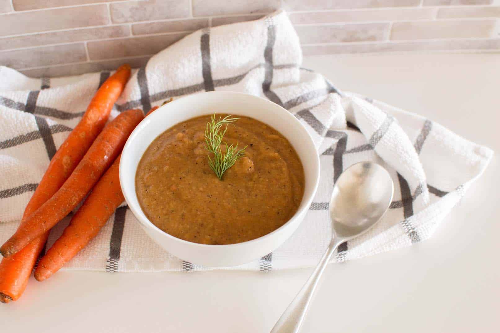 Whip up a batch of this easy and delicious homemade Carrot Lentil Soup! Perfect for a cozy night in.