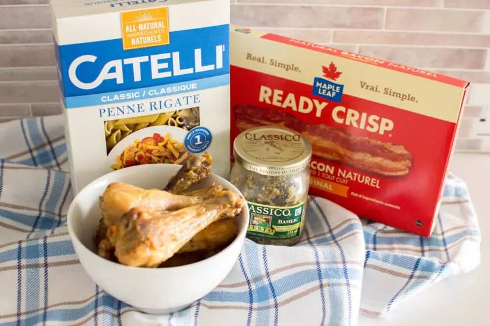 Busy weeknights call for Bacon and Chicken Pesto Pasta! This fragrant dish is a lifesaver - homemade with shortcuts for a delicious meal in minutes!