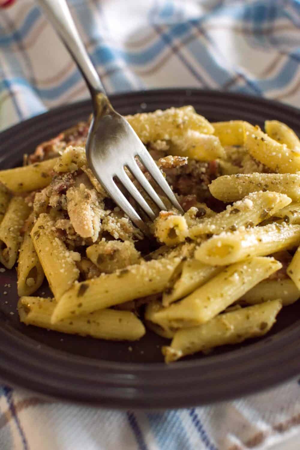 Busy weeknights call for Bacon and Chicken Pesto Pasta! This fragrant dish is a lifesaver - homemade with shortcuts for a delicious meal in minutes!