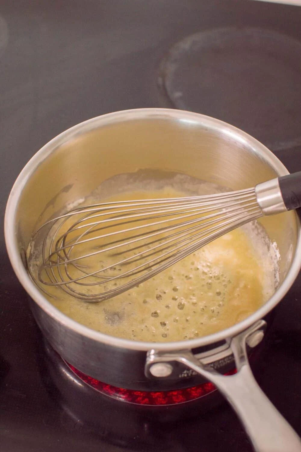 Melting butter and flour to start the process of making a roux