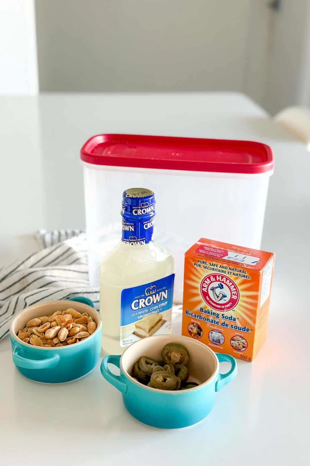 Ingredients laid out on a white table to make Jalapeno Peanut Brittle