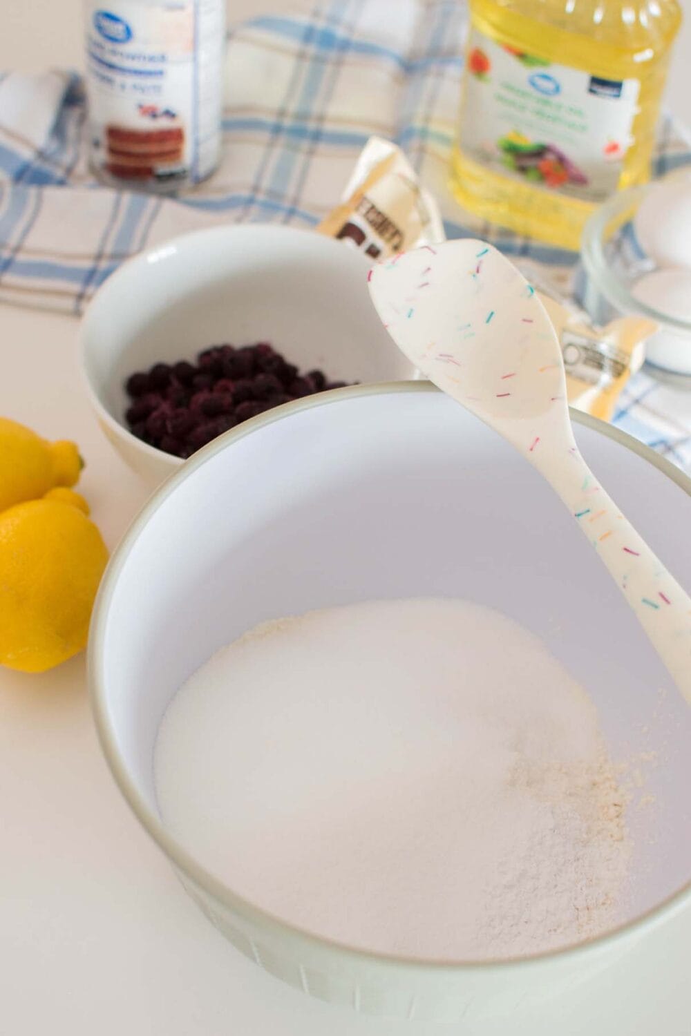 Mixing dry ingredients to make Lemon Blueberry White Chocolate Muffins