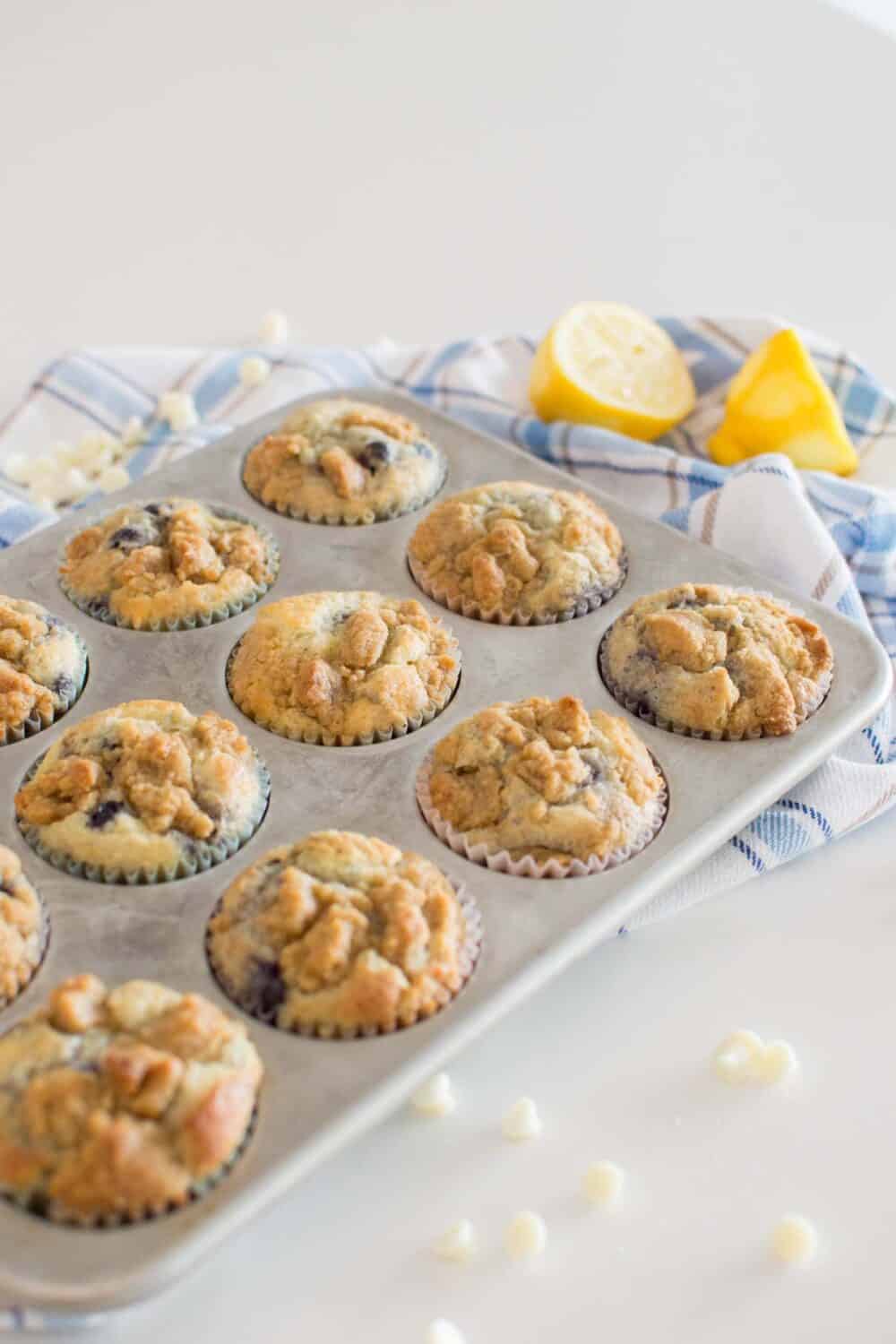 Lemon Blueberry White Chocolate Muffins cooling in a muffin tin