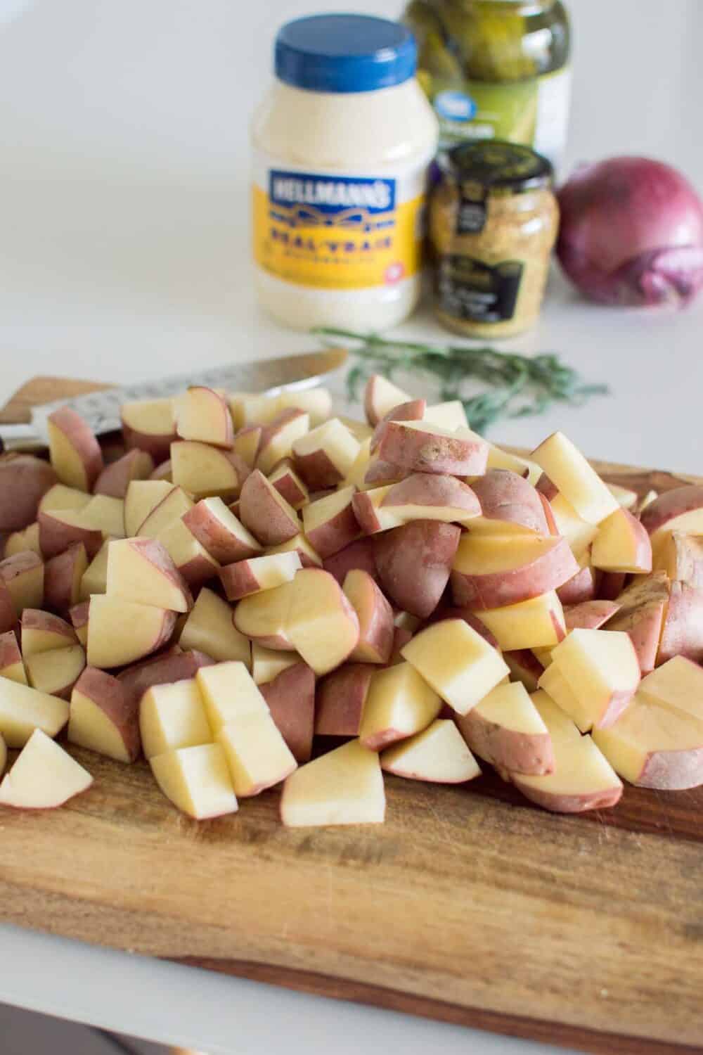 Chopped red potatoes prepared for loaded dill pickle potato salad