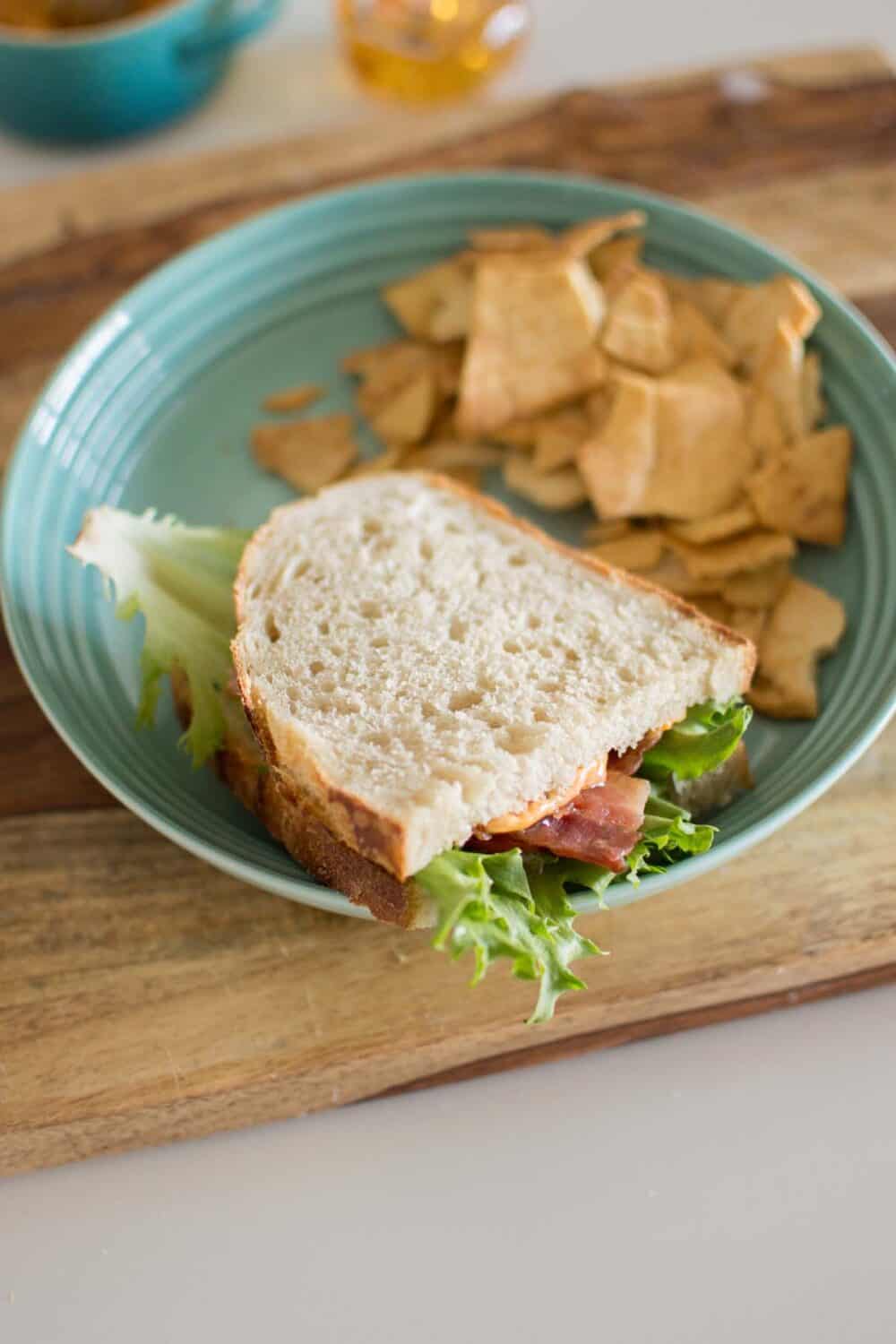 Close-up of BLT sandwich with crispy bacon, lettuce, and tomato layers