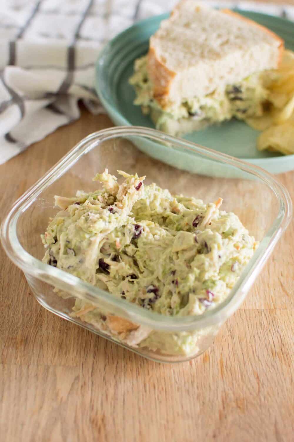 Avocado Ranch Chicken Salad stored in a glass container for meal prep